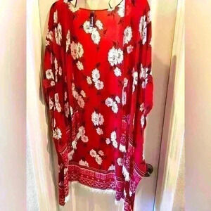 Red Express kimono. Size Medium. Worn once. White flowers on red.